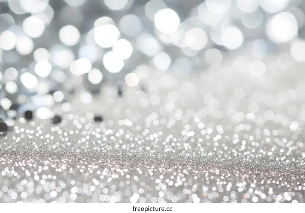 Silver glitter texture with shiny sparkles
