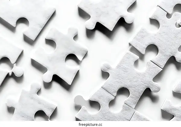 White Puzzle Pieces on White Background