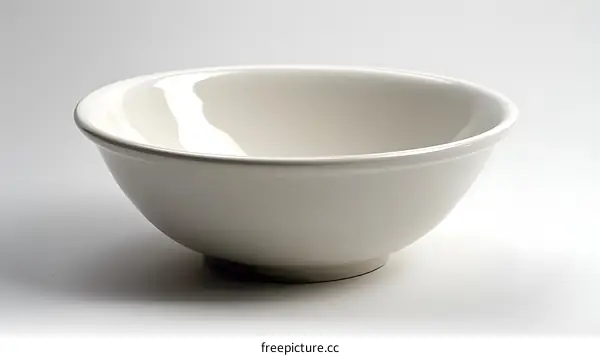 A Single White Bowl on a White Background