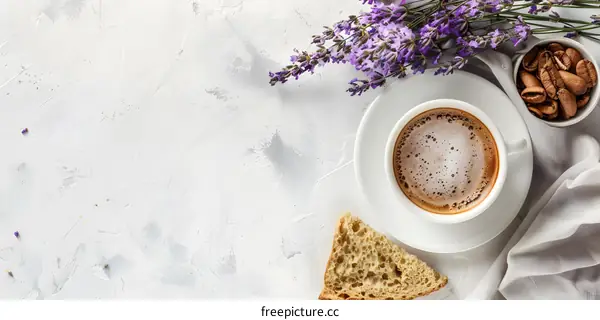 Coffee, Bread, and Lavender on White Table