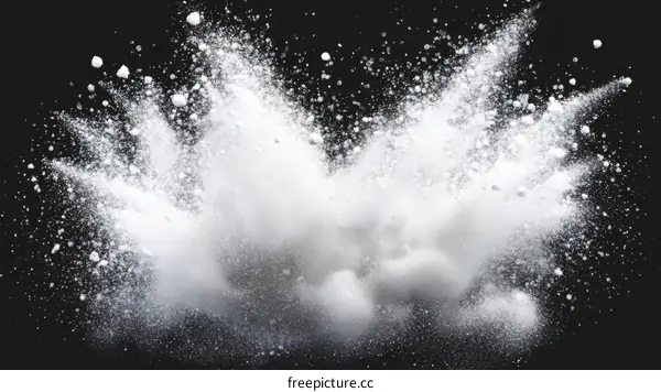 White Powder Explosion on Black Background
