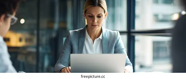 Businesswoman Working on Laptop in Office