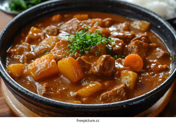 A delicious and hearty beef stew with potatoes and carrots.