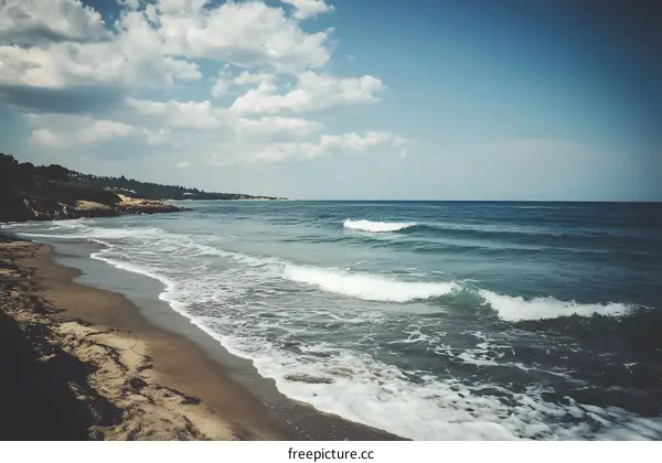 Beautiful Blue Ocean Waves Crashing on Sandy Beach