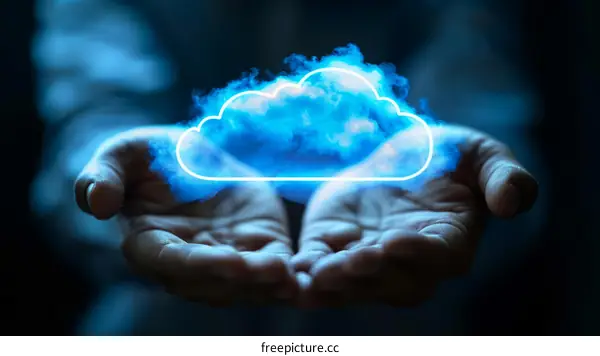 Blue cloud computing concept in the hand