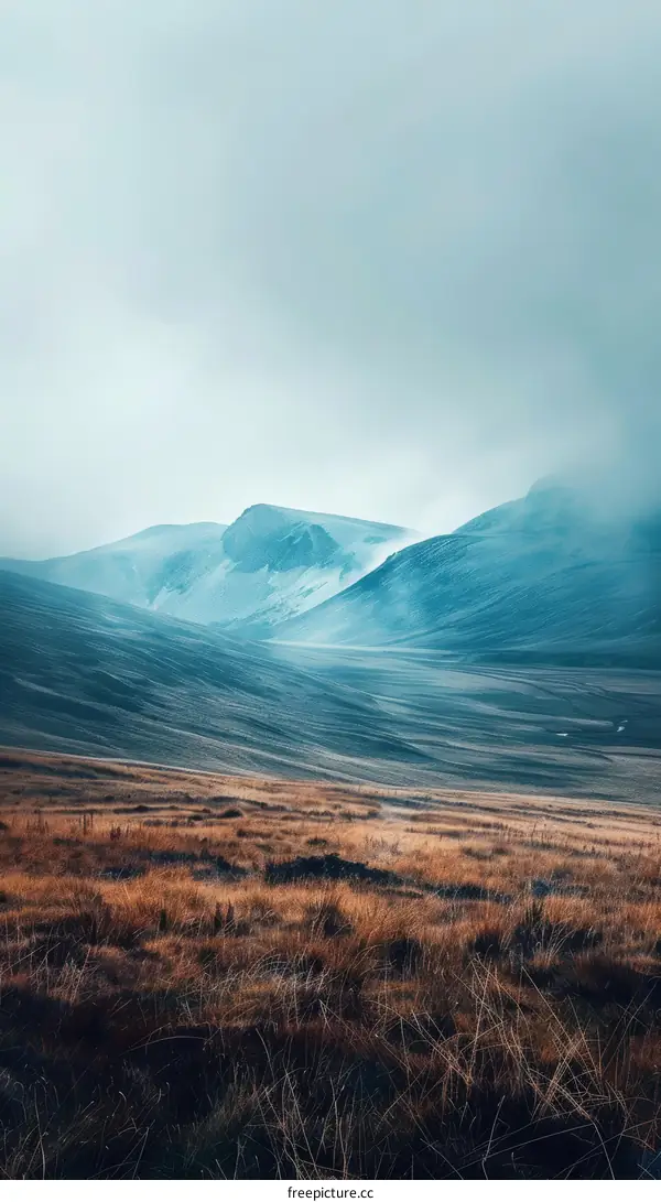 Foggy Mountain Landscape with Rolling Hills