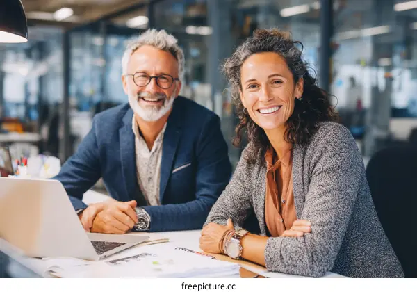 Two Business Colleagues in Modern Office