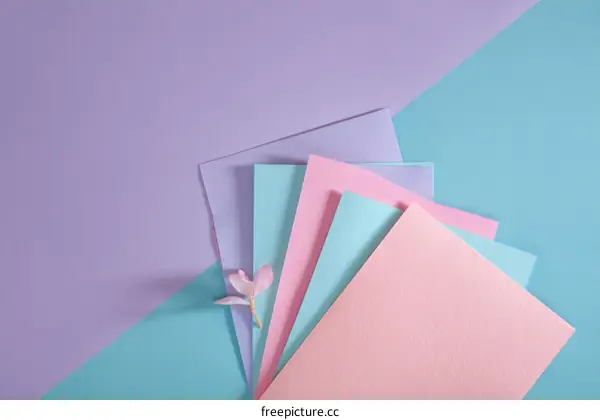 Pastel Colored Paper Sheets Composition