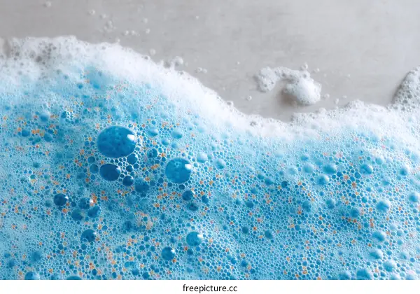 Closeup of Light Blue Cleaning Soap Bubbles