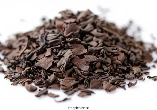 Loose Black Tea Leaves on White Background