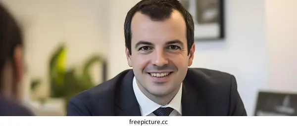 Smiling Businessman Portrait Wearing Suit and Tie