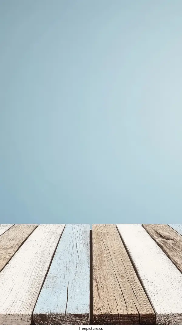Vintage Wooden Table Top Against Light Blue Background