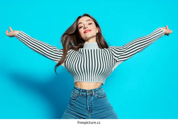 Stylish Woman in a Striped Knitted Sweater