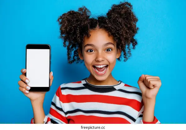 Girl with Smartphone Shows the Display