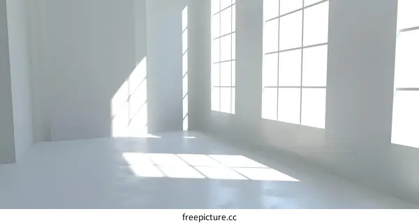 Minimalist White Room with Windows and Sunlight