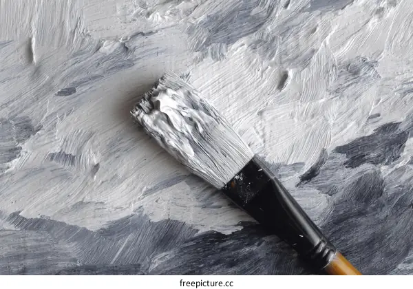 Abstract Painting with Paintbrush on Canvas