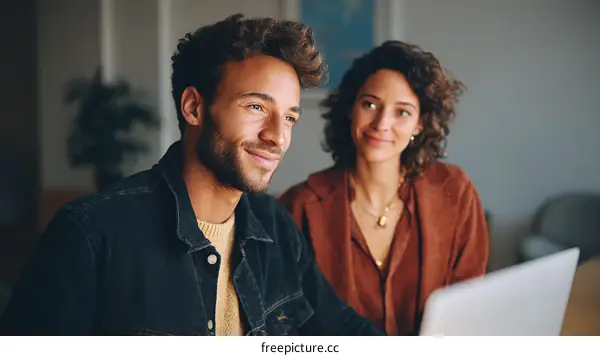 Two Diverse Colleagues Collaborating