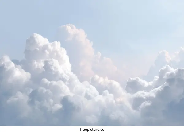 Fluffy Clouds in Pastel Sky