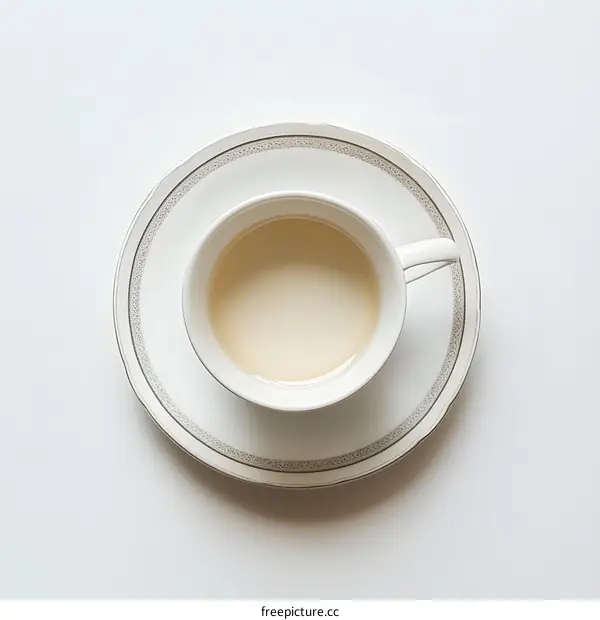 White Teacup On White Saucer