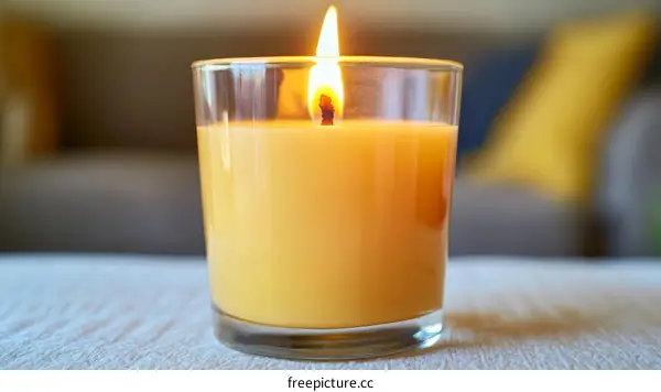 Burning Candle in a Glass Jar