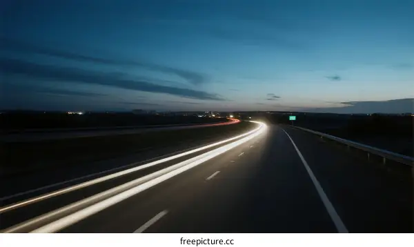 Long Exposure Light Trails on Empty Highway at Dusk