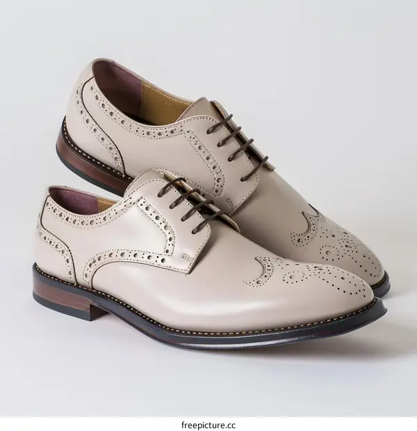 Beige leather brogue shoes