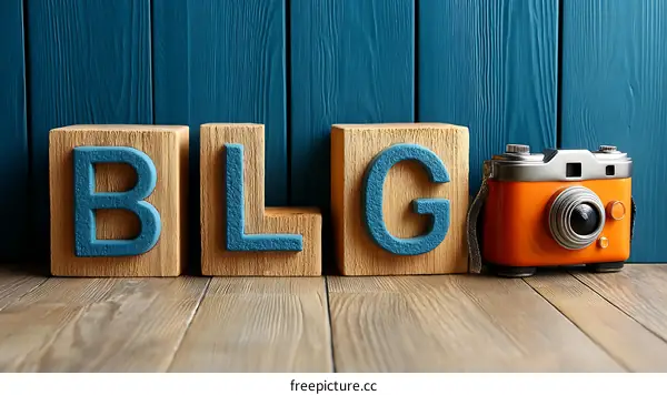 Wooden Block Letters Spelling BLOG with Camera