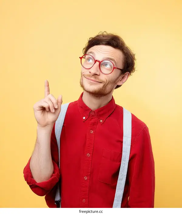 Stylish Caucasian Man Pointing Upward