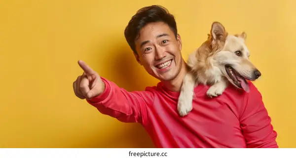 Portrait of a happy Asian man with his dog
