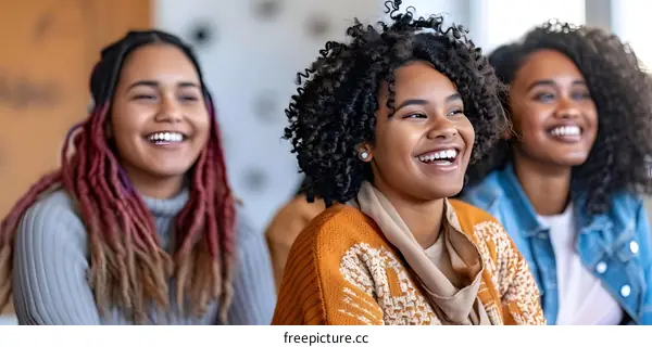 Three African American Women Laughing Together