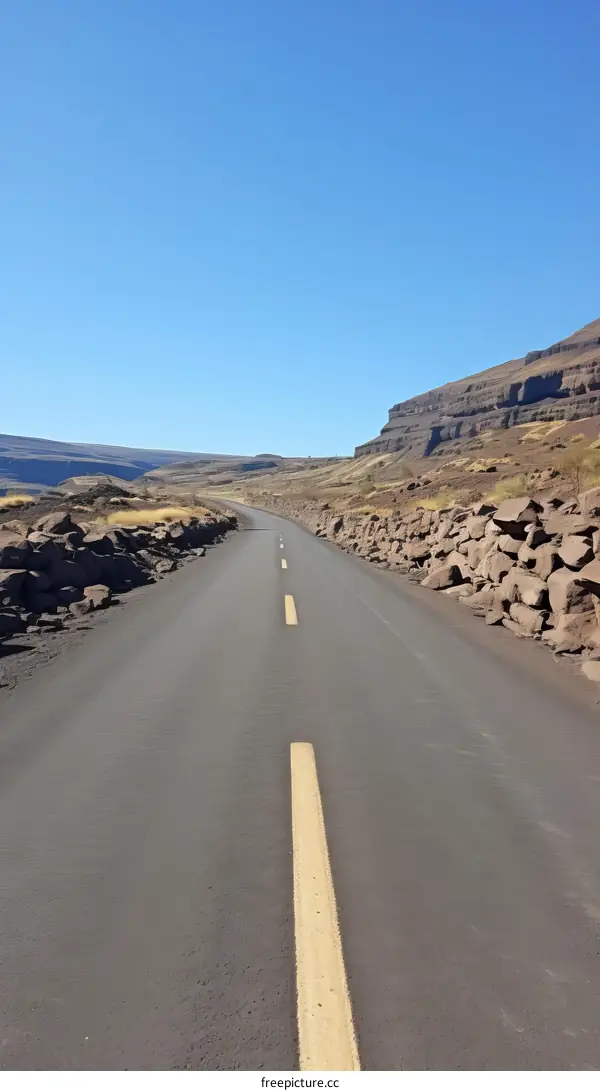 Paved road through a canyon