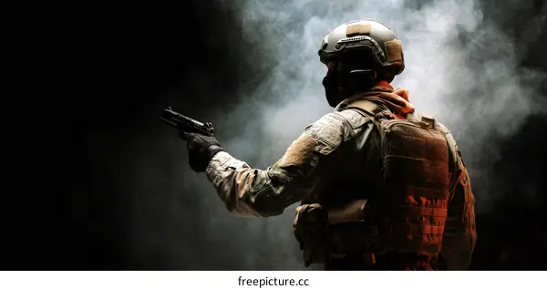 Special Forces Soldier Aiming Pistol in Smoke Filled Environment