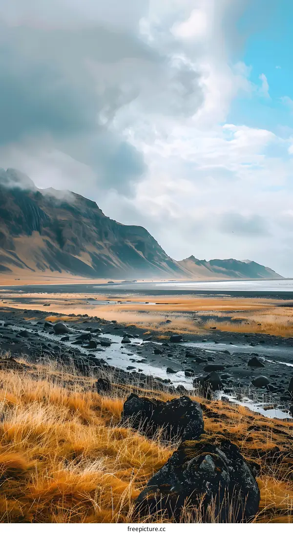 Icelandic Landscape With Mountains And Grass