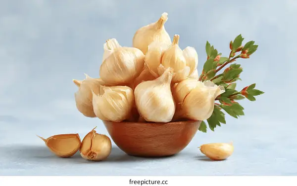 Fresh Garlic Heads in Wooden Bowl
