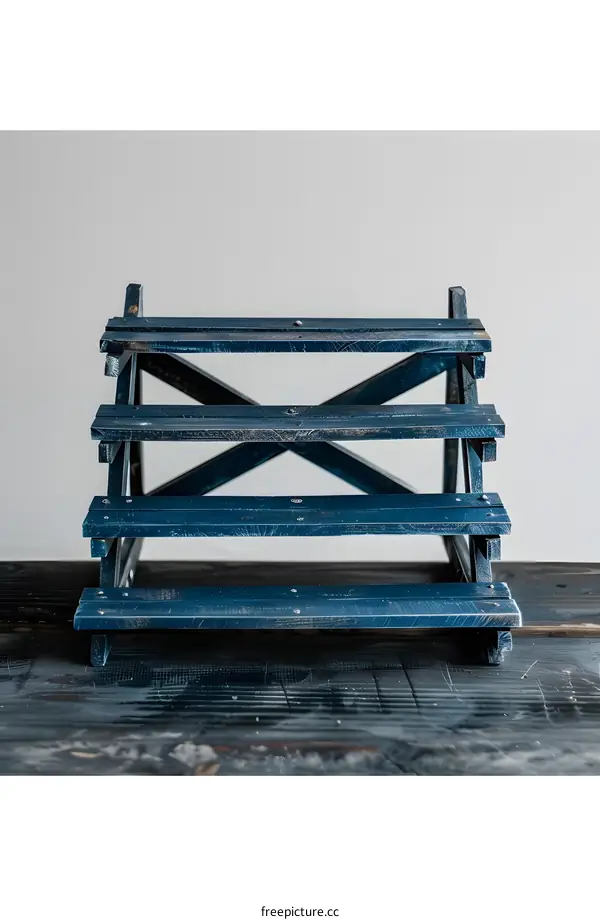 Blue Wooden Display Stand With Four Shelves