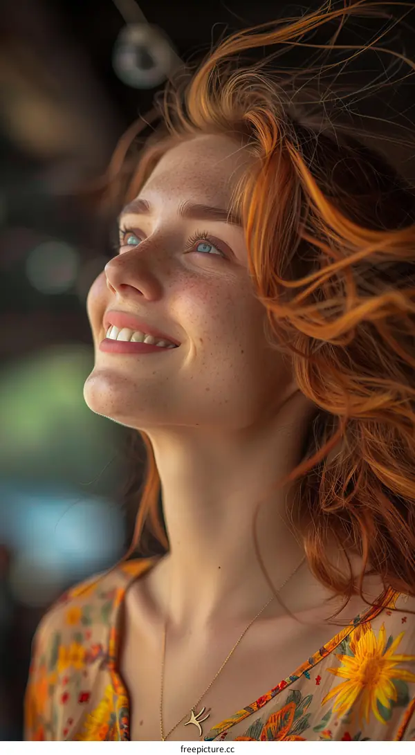 Portrait of a Beautiful Woman with Red Hair