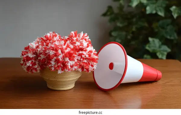 Red and White Knitted Flower Arrangement with Traffic Cone