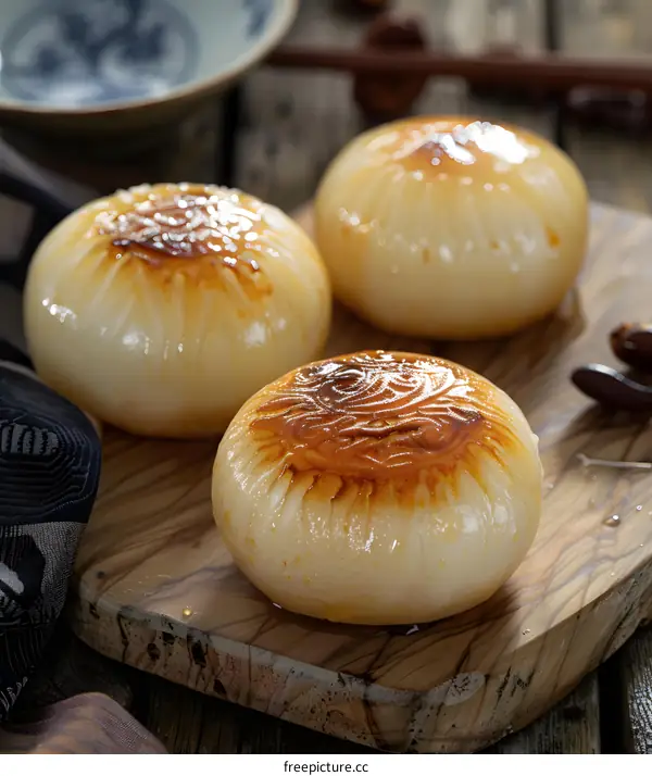 Roasted Onions on Wooden Cutting Board