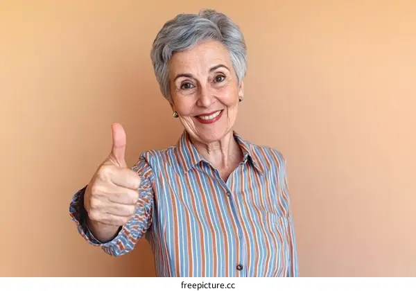 Smiling Senior Woman Giving a Thumbs Up