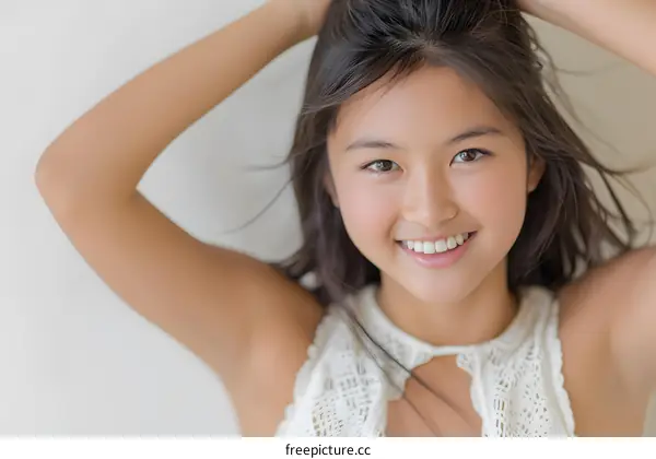 Portrait of a smiling Asian teenage girl