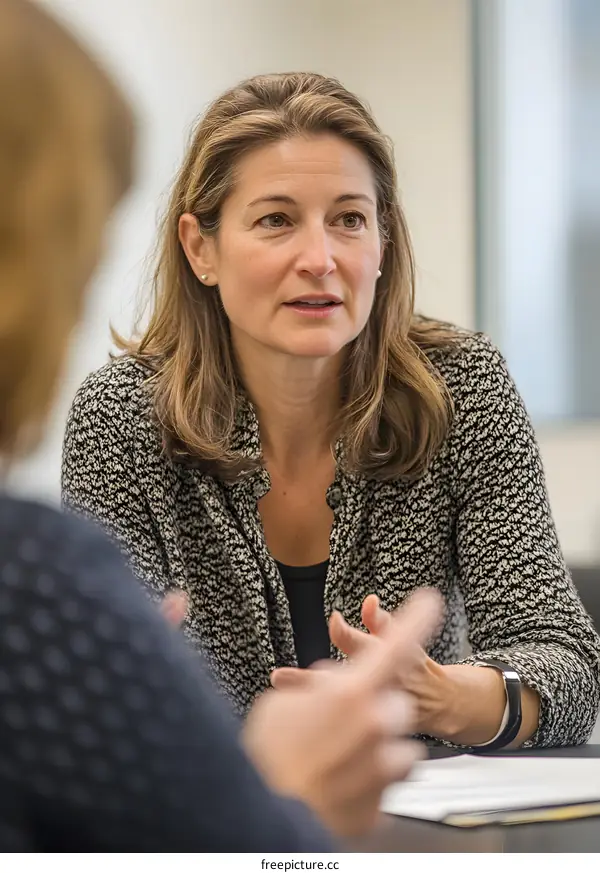 Woman Talking During a Business Meeting