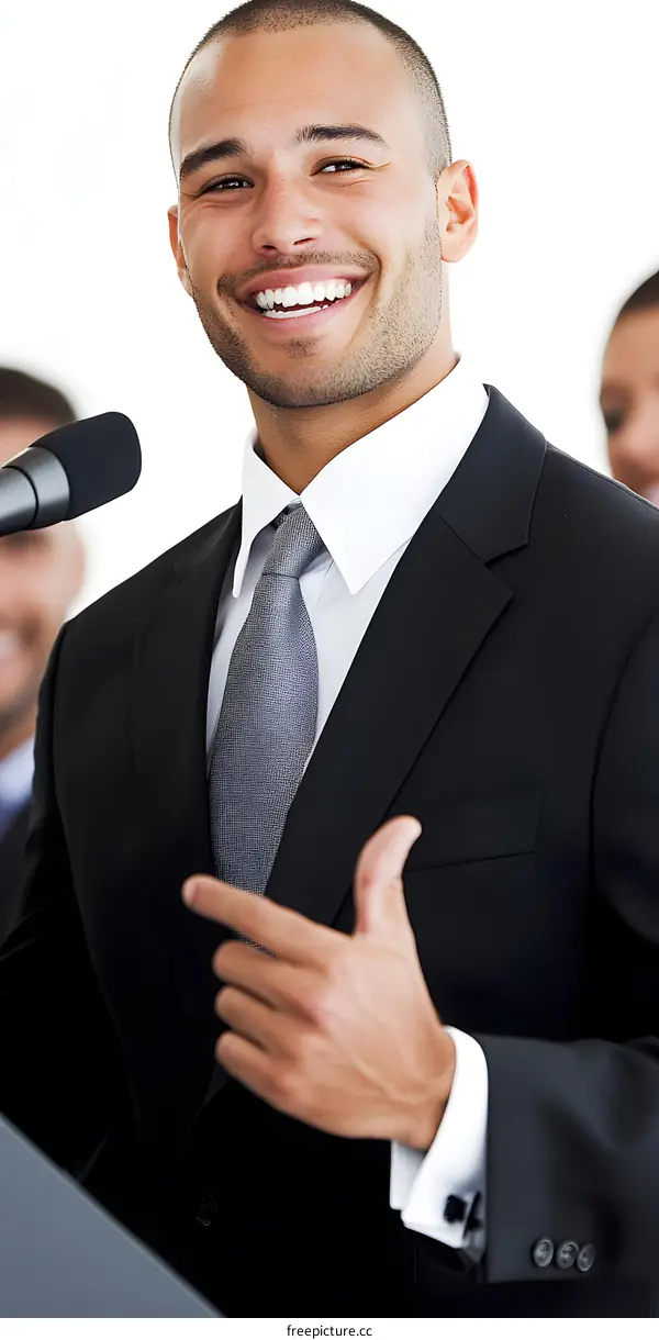 Smiling Businessman Giving a Presentation