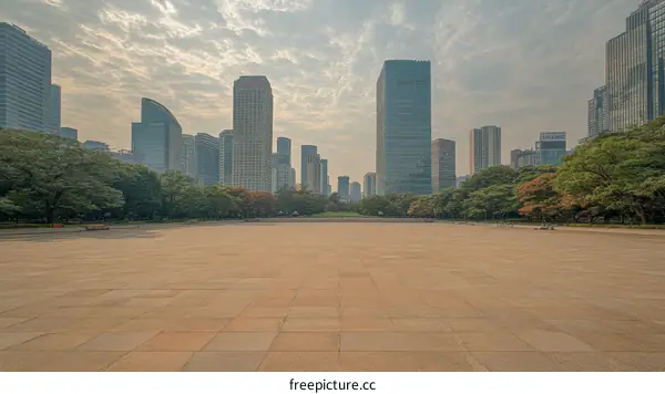 Urban Park Plaza Facing Modern City Skyline