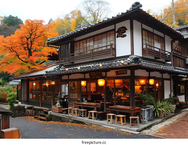 Traditional Japanese Building With Autumn Leaves