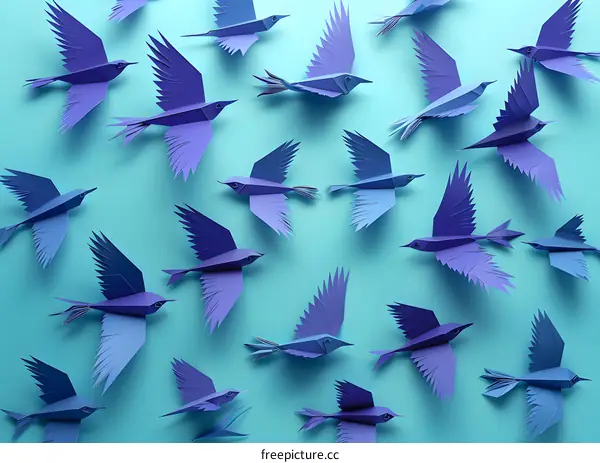 Blue paper birds flying on blue background