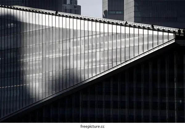 Modern Building Architecture with Geometric Patterns and People Silhouettes