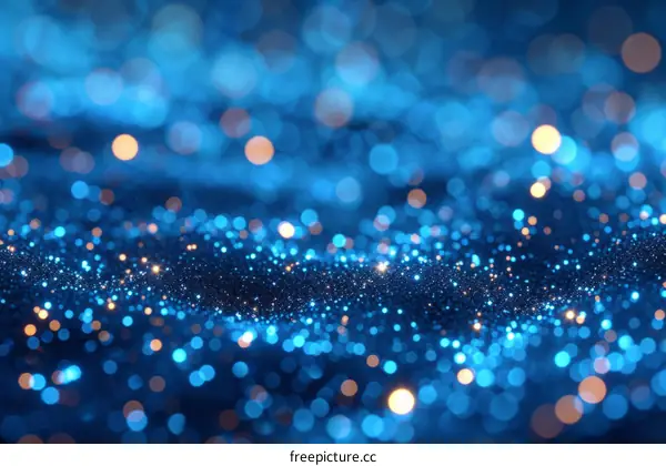 Blue and gold glowing particles background