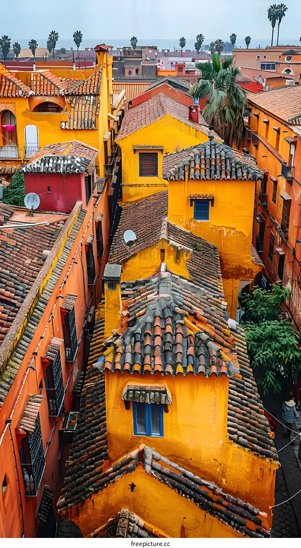Aerial View of Yellow Houses with Orange Rooftops in Morocco