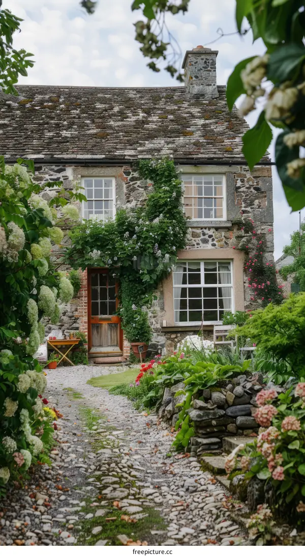 Charming Stone Cottage with Flowers