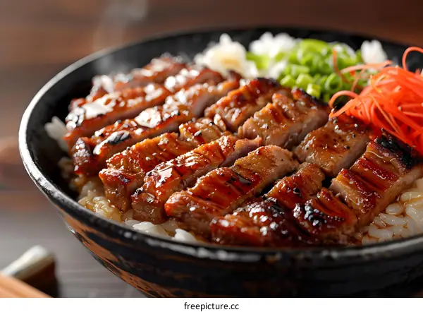 A delicious and healthy meal of grilled pork and rice.